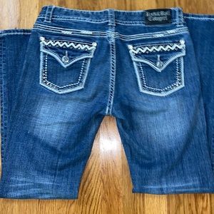 Rock and roll cowgirl blue jeans